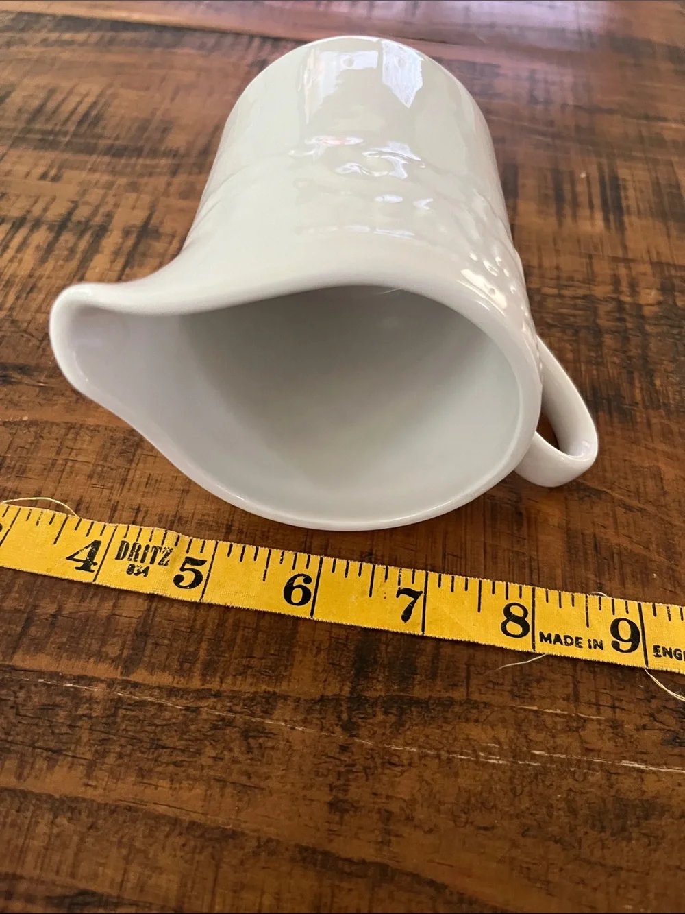 Classic White Ceramic Creamer with Embossed Detail